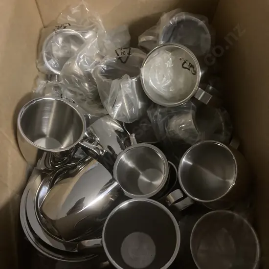 Selection Of Stainless Steel Cups And Saucers
