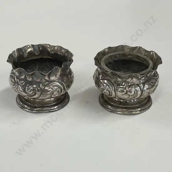 Pair Sterling Silver Salt Sellars (one with glass insert). Lion, Sheild?, 'o'