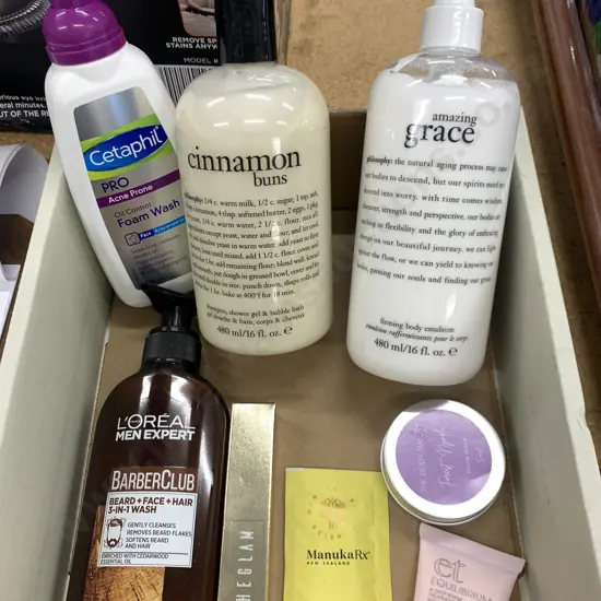 Assortment Of Beauty Products Including Cetaphil Foam Wash, Cinnamon Buns, Amazing Grace Etc