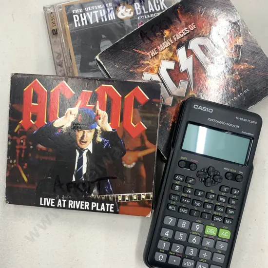 Casio Calculator with selection of CD's incl AC/DC, Rhythm and Black etc