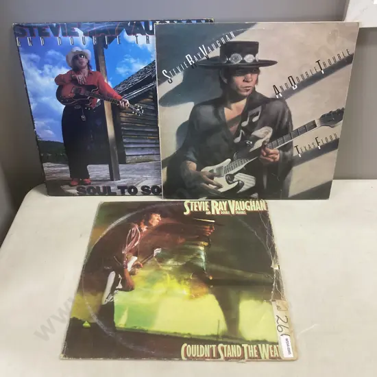 Lot of Three Stevie Ray Vaughan LPs, Soul To Soul, Texas Flood, Couldn't Stand The Weather