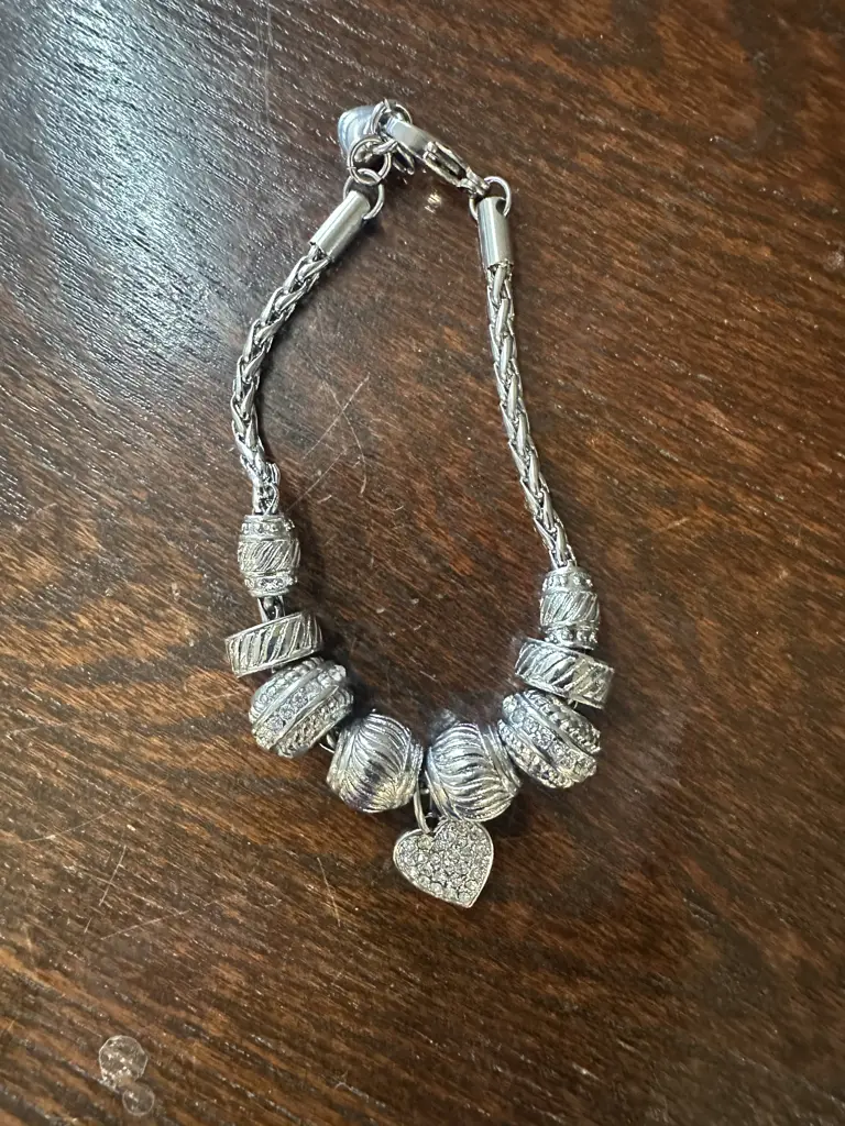 Silver Coloured Bracelet With Assorted Charms Image 1++