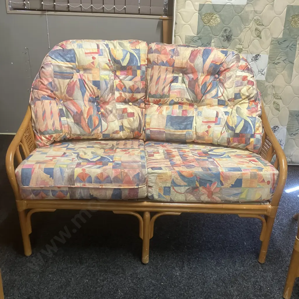 Garry Masters Rattan & Cane 2 Seater Sofa With 2 Armchairs & Glass Topped Coffee Table - Bright Abstract Floral Fabric Image 1++