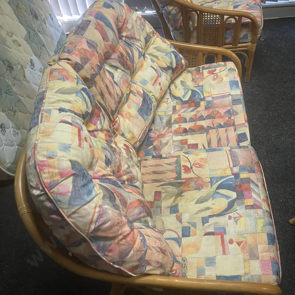 Garry Masters Rattan & Cane 2 Seater Sofa With 2 Armchairs & Glass Topped Coffee Table - Bright Abstract Floral Fabric Image 1++