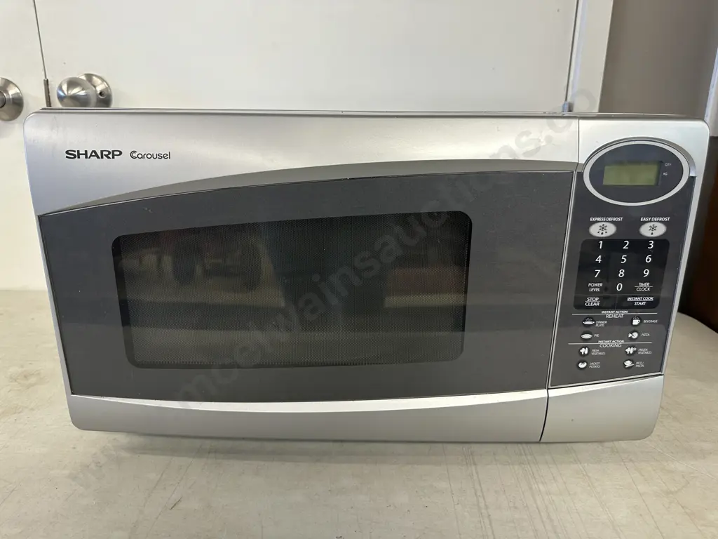 Sharp Carousel Microwave R-331Y(s) Image 1++