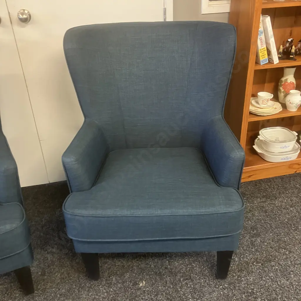 Pair of High Curved Wing Back Chairs In Blue Fabric With Black Legs Image 1++