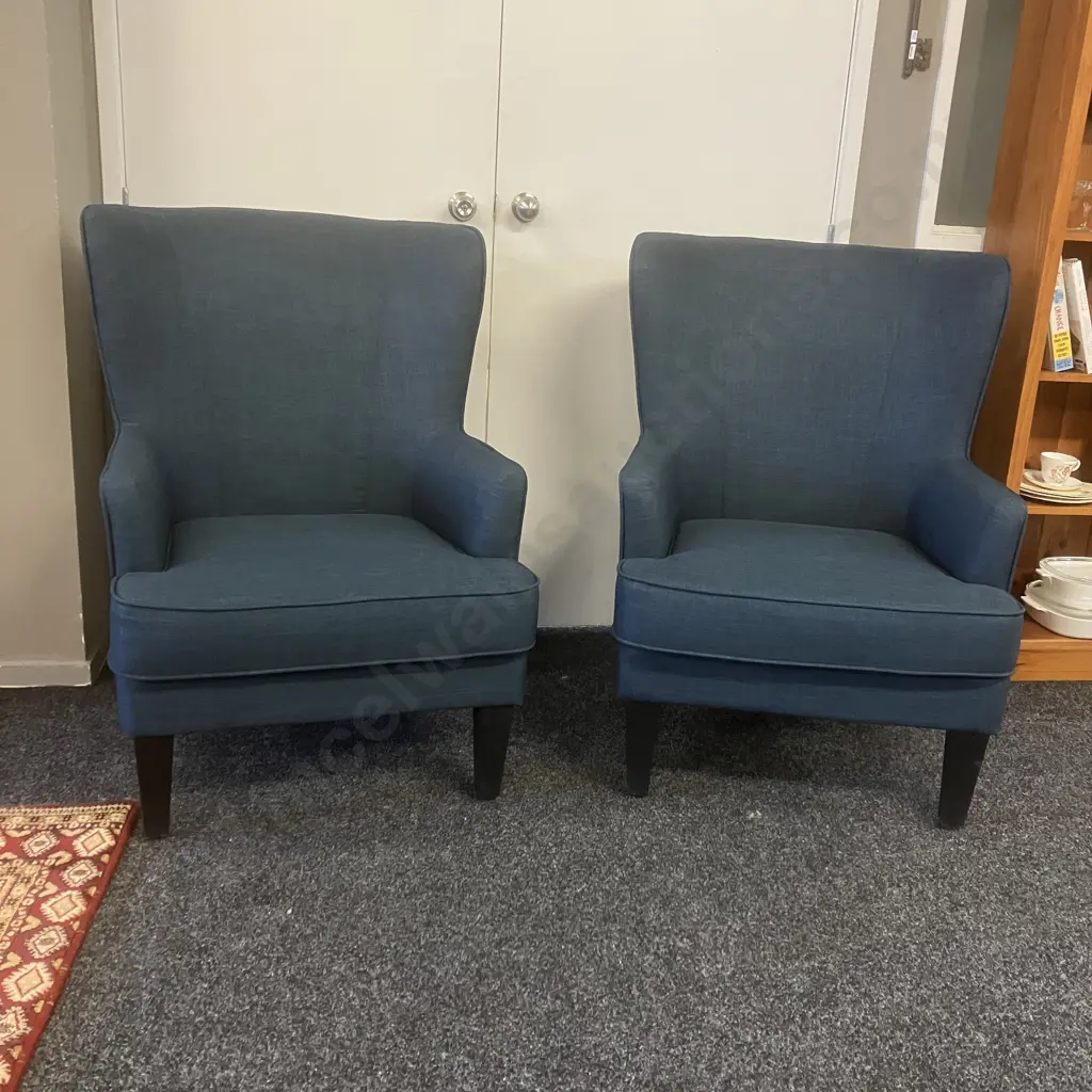 Pair of High Curved Wing Back Chairs In Blue Fabric With Black Legs Image 1++