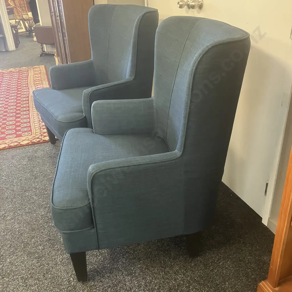 Pair of High Curved Wing Back Chairs In Blue Fabric With Black Legs Image 1++