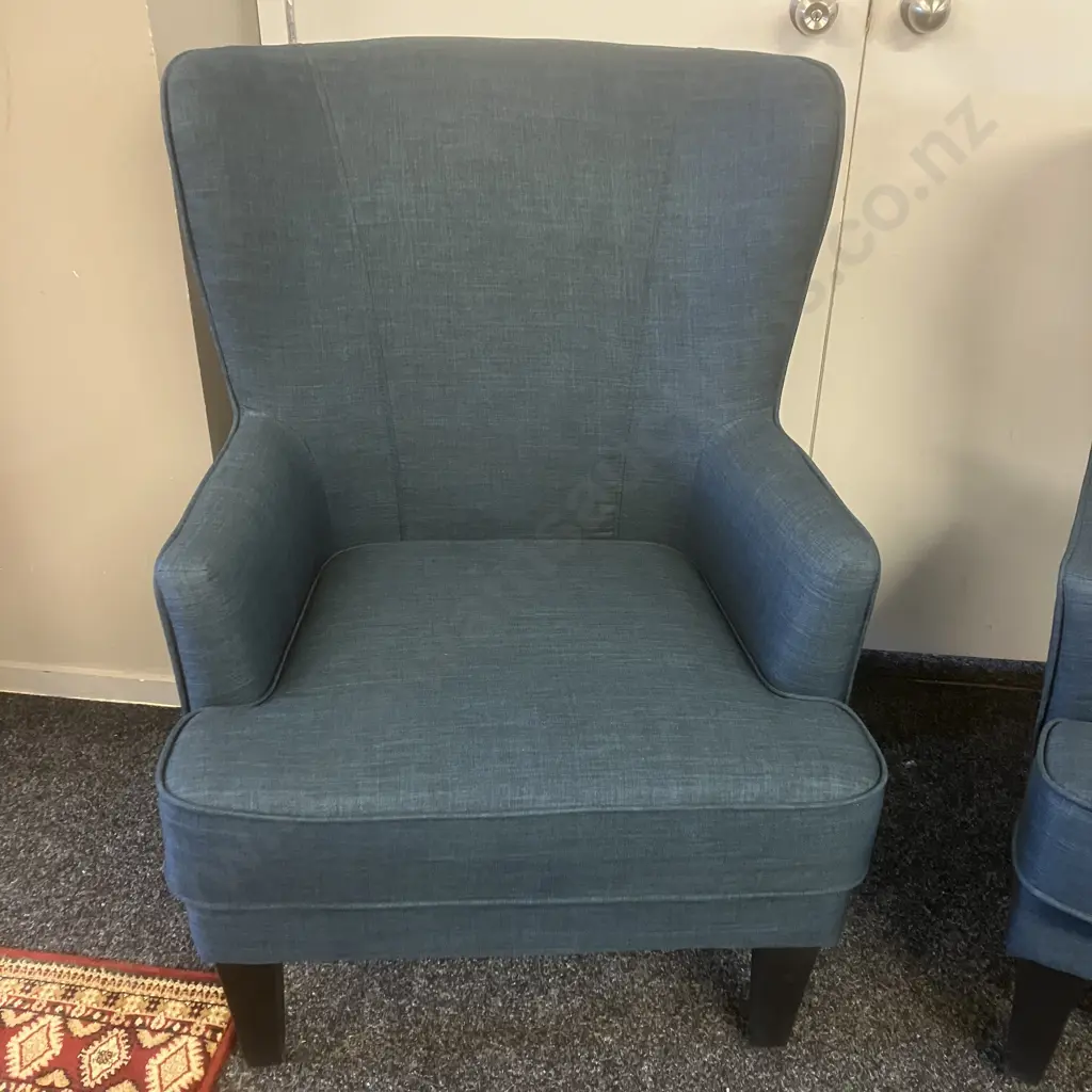 Pair of High Curved Wing Back Chairs In Blue Fabric With Black Legs Image 1++