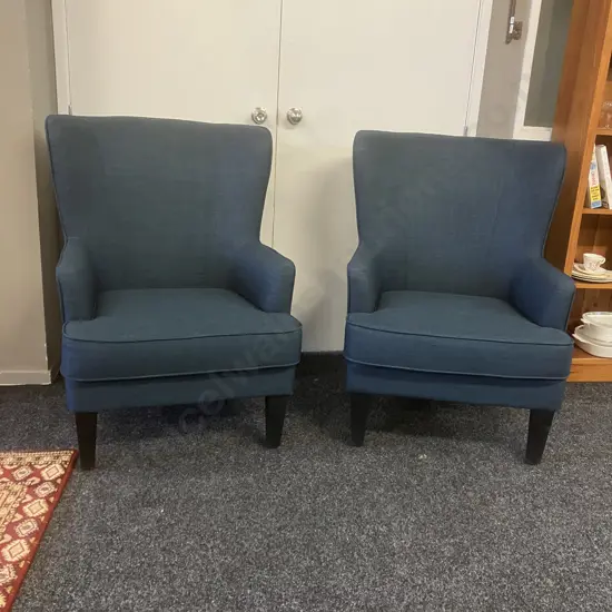 Pair of High Curved Wing Back Chairs In Blue Fabric With Black Legs