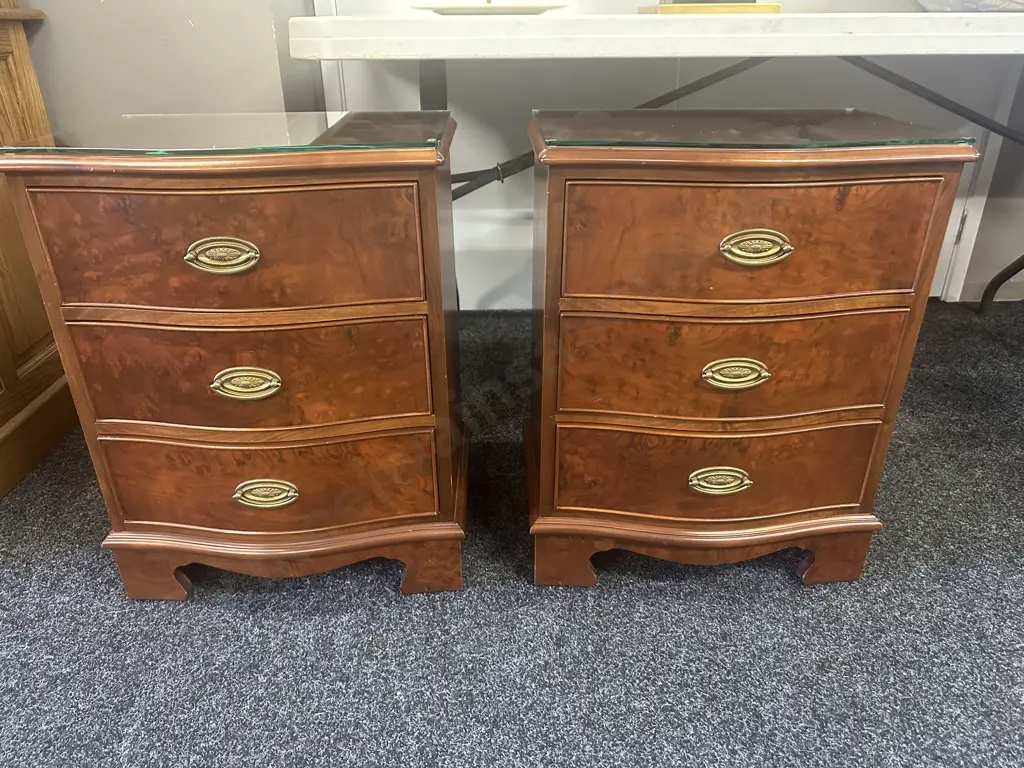 Pair Of Wooden Walnut Detailed Three Drawer Bedsides With Brass Ornate Handles & Glass Top. H62,W48,D34cm. Image 1++