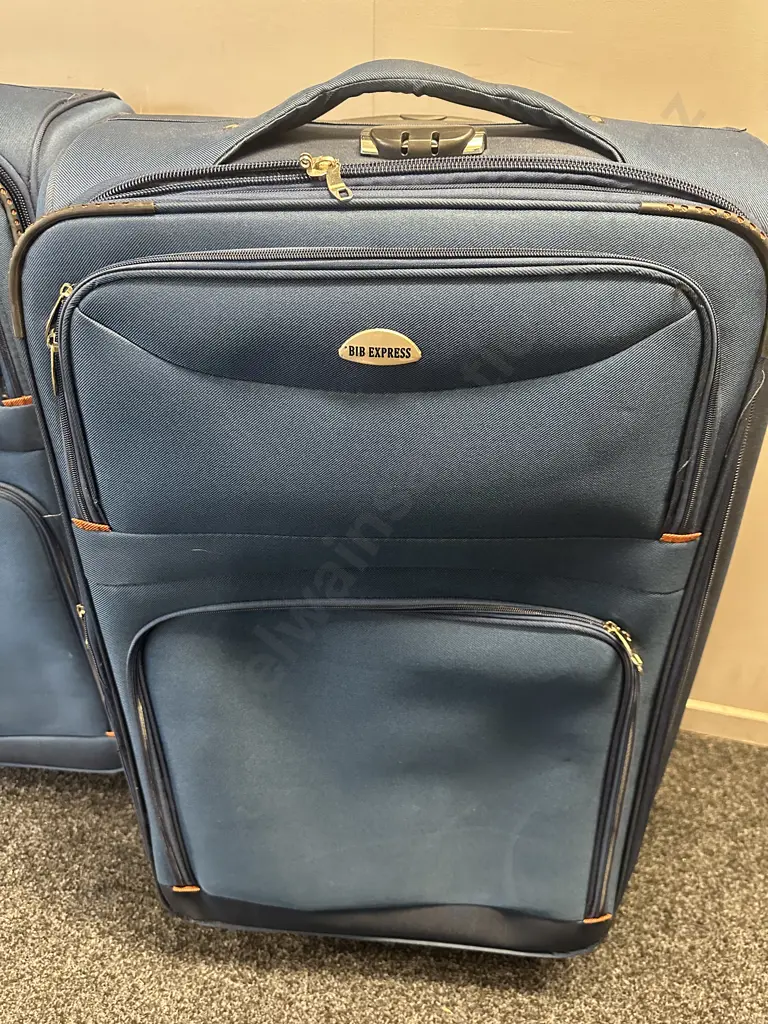 Pair Of Blue BIB Express Suitcases H88,W52cm. Image 1++