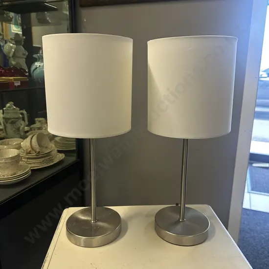 Pair Of Living & Co Table Lamps Brushed Chrome Bases With Cream Shades