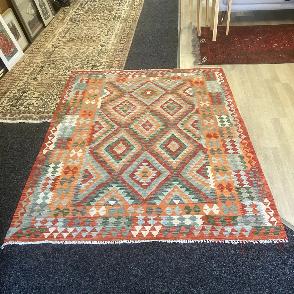 Floor Rug - Reds, Greens, Orange Geometric Patterned. 155 x 198cm Image 1++