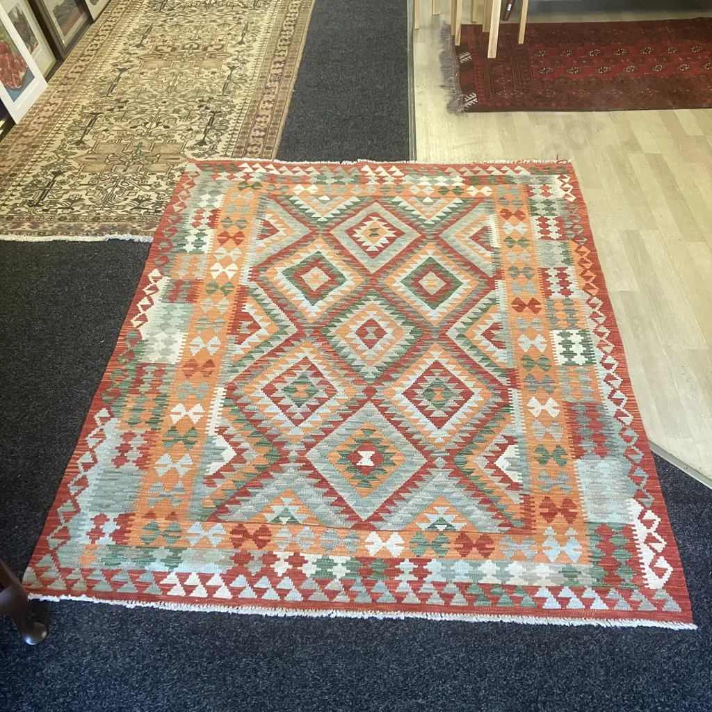 Floor Rug - Reds, Greens, Orange Geometric Patterned. 155 x 198cm Image 1++