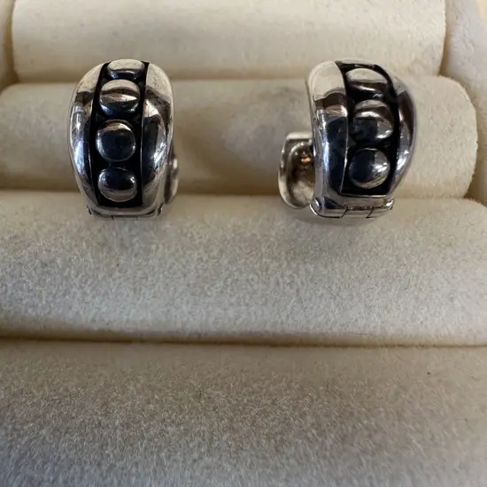 Pair Of Silver Coloured Earrings With Relief Detail