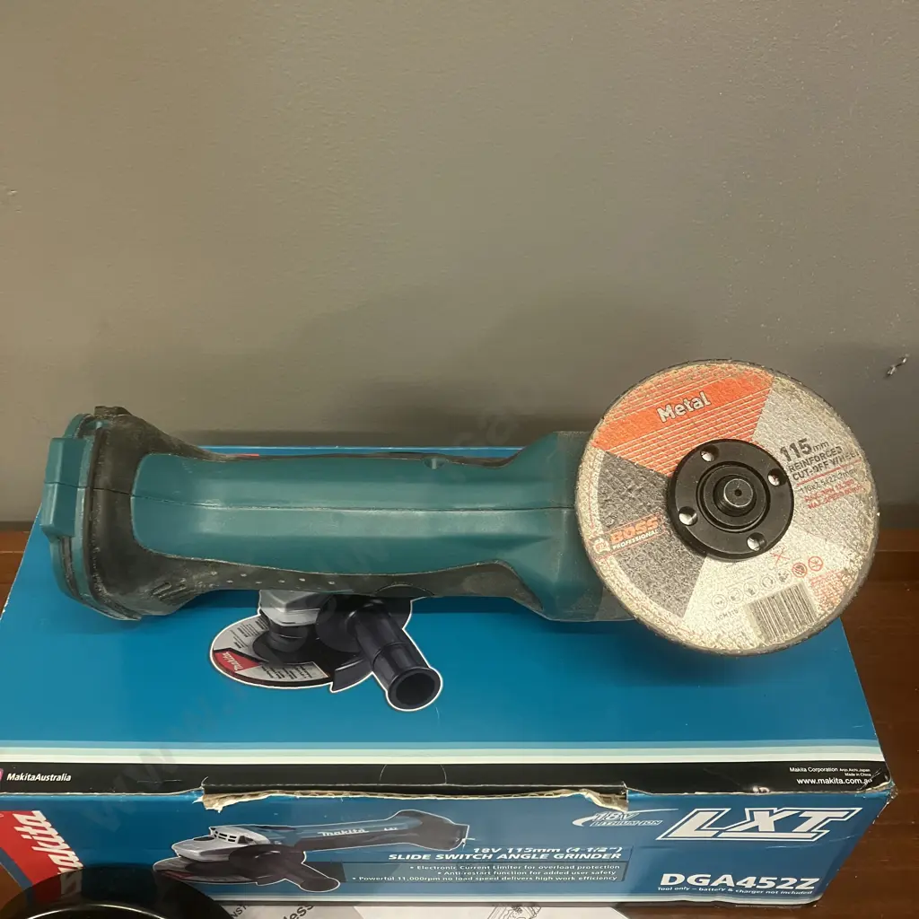 Makita 18V LXT 115mm (4-1/2") Slide Switch Angle Grinder Skin Only - DGA452Z Image 1++