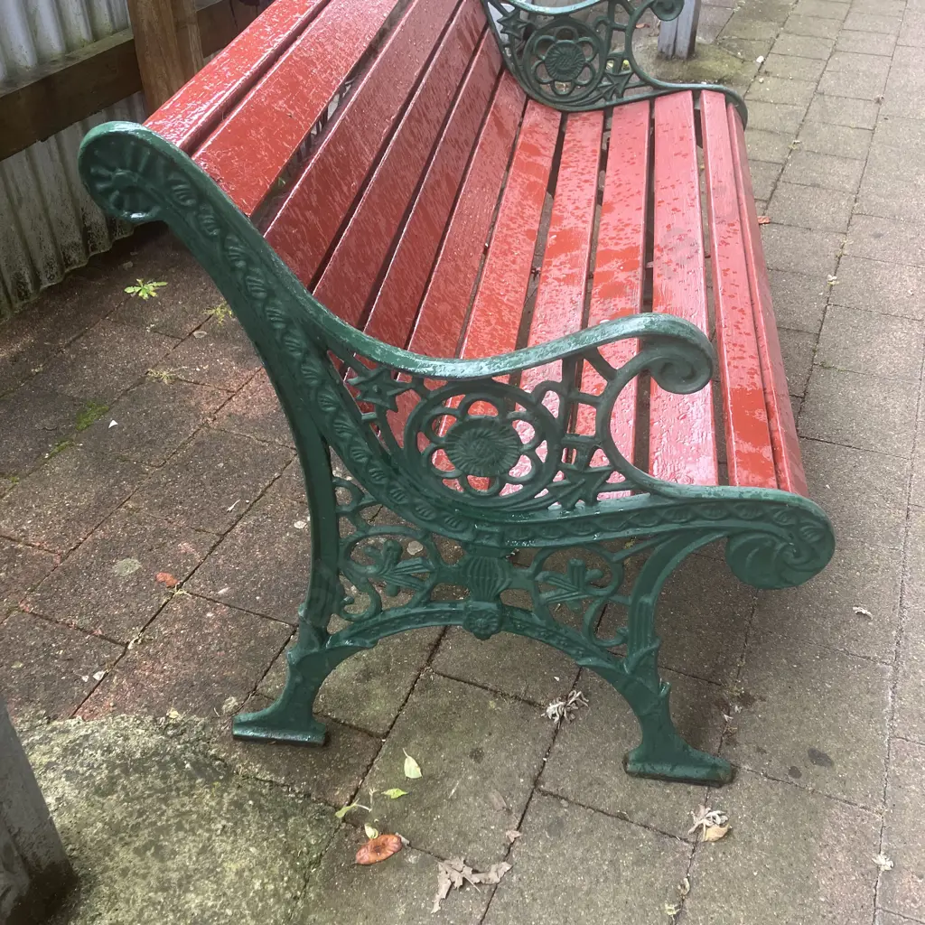 Heavy Cast Iron Park Bench, Green Painted Ornate Ends With Red Painted Wood Slats. H76 W117 D65cm Image 1++