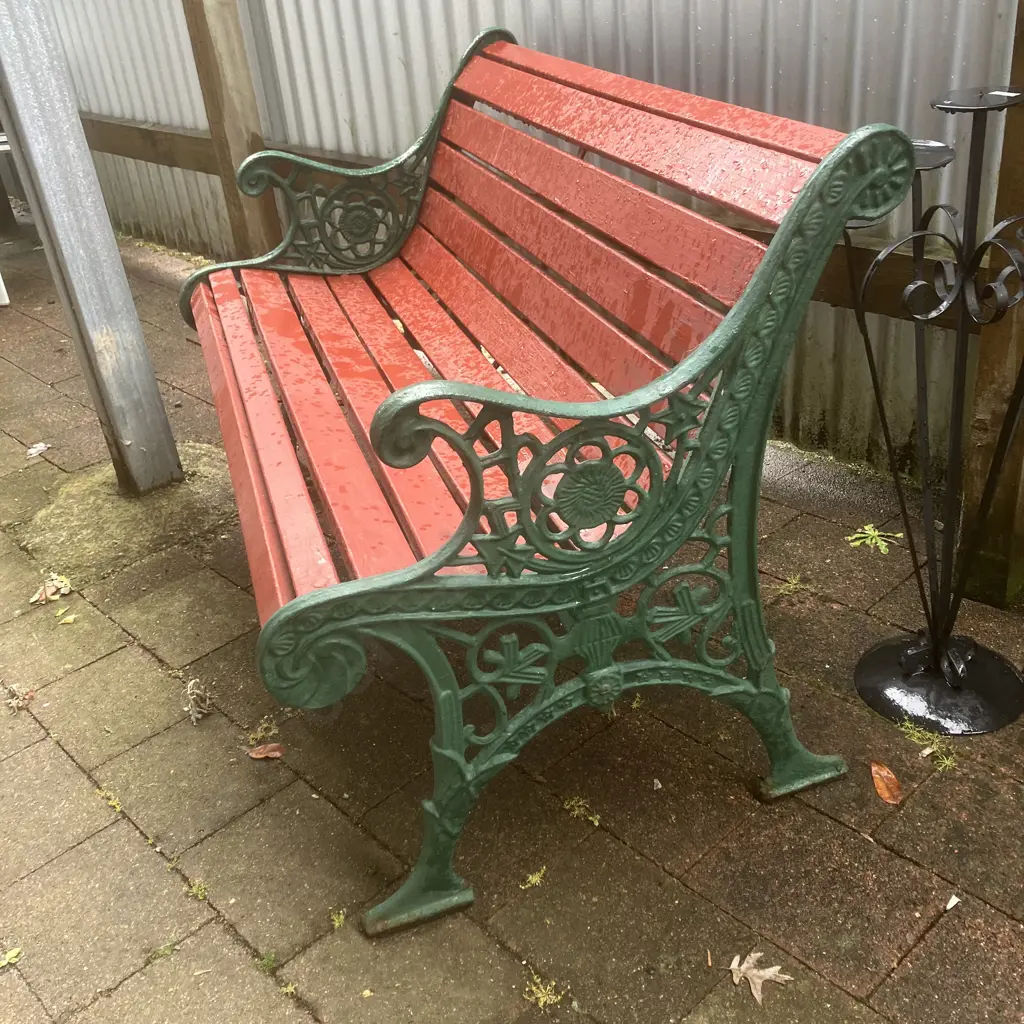 Heavy Cast Iron Park Bench, Green Painted Ornate Ends With Red Painted Wood Slats. H76 W117 D65cm Image 1++