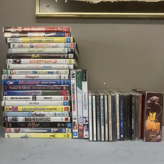 DVD's  x 24 With Assorted CDs