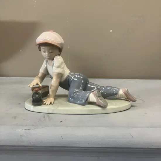 Lladro Figurine "All Aboard" Porcelain Figurine #7619, Issued 1992 Retired 1995. 13 x 19cm