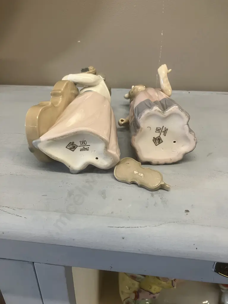 Nao by Lladro "Girl Playing Cello" Porcelain Figurine 1992-2007. H19cm (No Bow) & "First Solo" 1987-1989 Damaged Image 1++