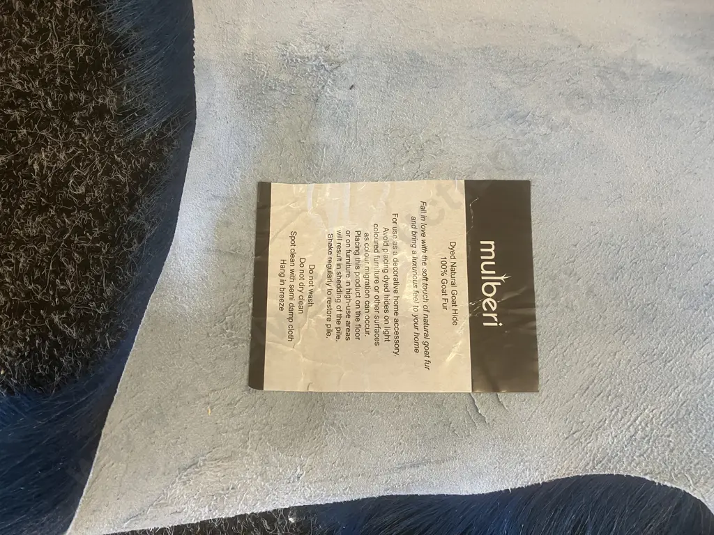 Pair of Blue Mulberi Dyed Natural Goat Hide Rugs. L88 & 98cm Image 1++