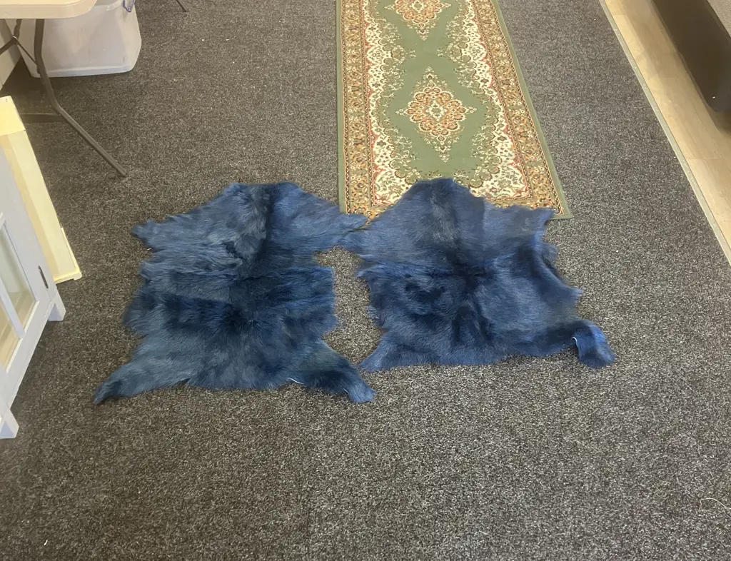 Pair of Blue Mulberi Dyed Natural Goat Hide Rugs. L88 & 98cm Image 1++