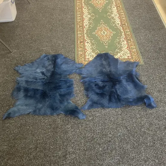Pair of Blue Mulberi Dyed Natural Goat Hide Rugs. L88 & 98cm