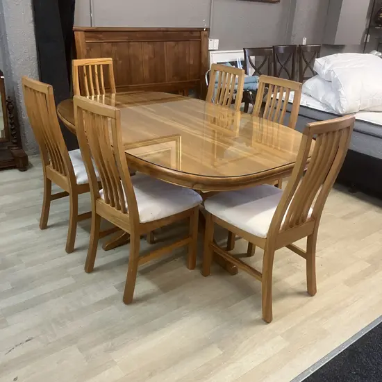 Solid Rimu Oval Dining Table Single Pedestal, Glass Cover With Six Slatted Back Chairs With Cream Fabric 76x180x114cm.