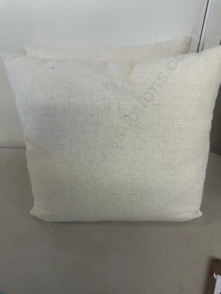 Pair Of Designer Cushions Cream Linen With Large Orange Symbol Image 1++