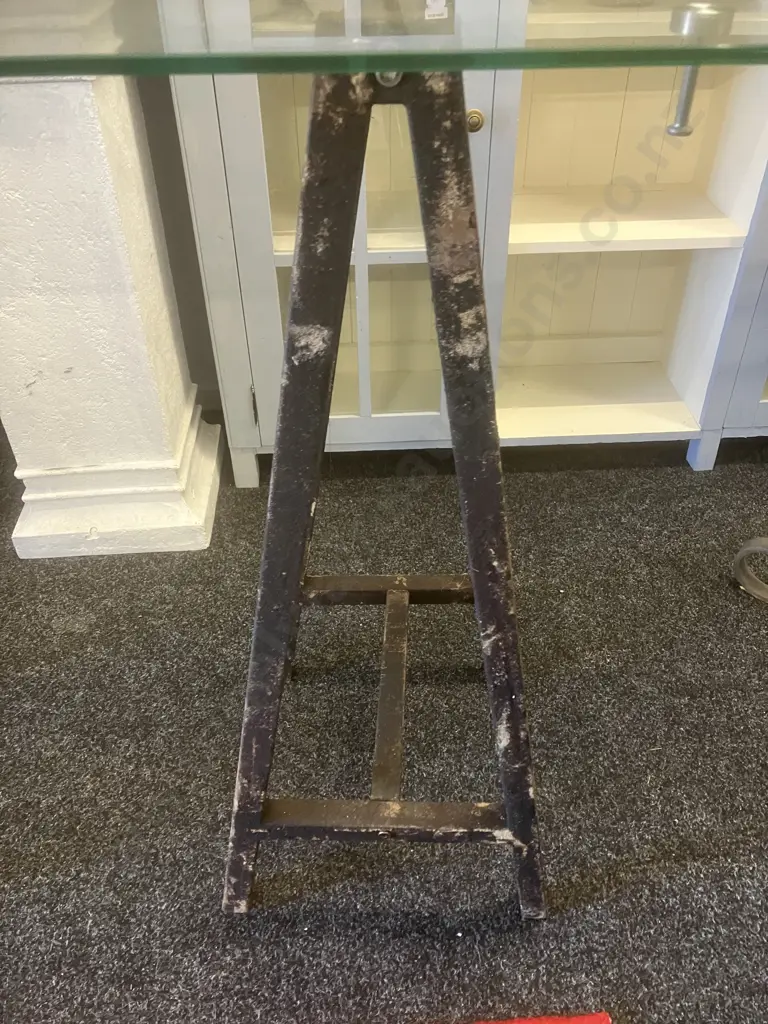 Glass Top Table On a Pair of Black Steel Trestles. H92.5 W140 D60cm Image 1++