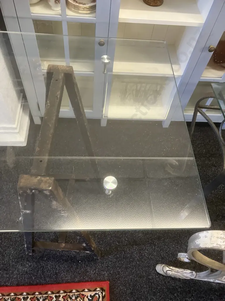 Glass Top Table On a Pair of Black Steel Trestles. H92.5 W140 D60cm Image 1++