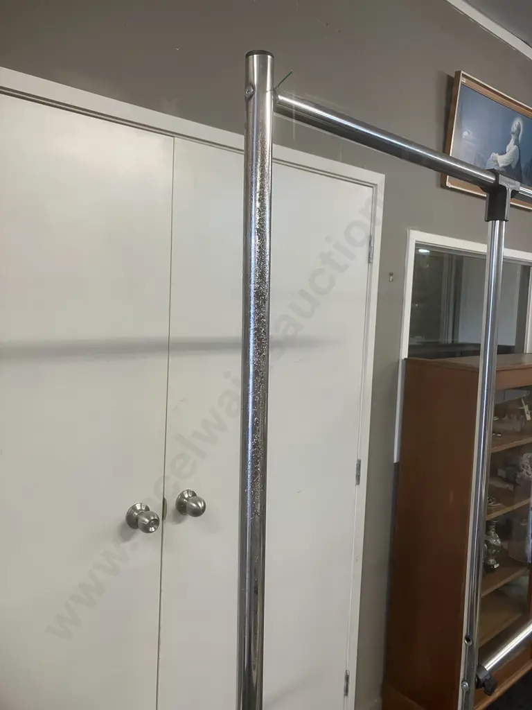 Chromed Dress Rack On Castors With Adjustable Middle Rail. 184 x 115cm Image 1++