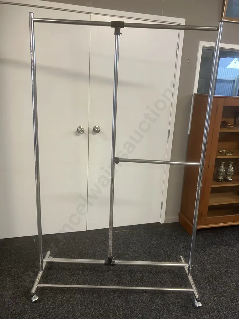 Chromed Dress Rack On Castors With Adjustable Middle Rail. 184 x 115cm Image 1++