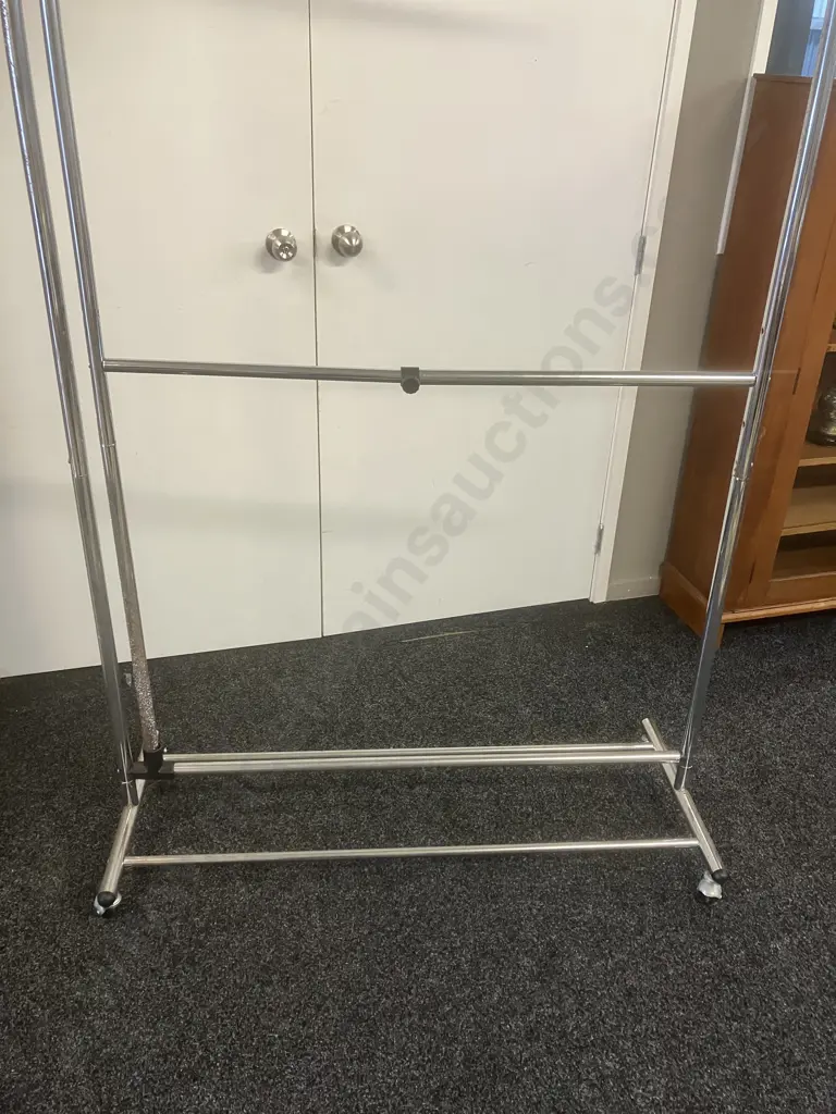 Chromed Dress Rack On Castors With Adjustable Middle Rail. 184 x 115cm Image 1++