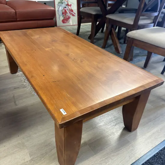 Woodpeckers Solid Rimu Badged Coffee Table With Shaped Top Edge. H80 W120 D60cm