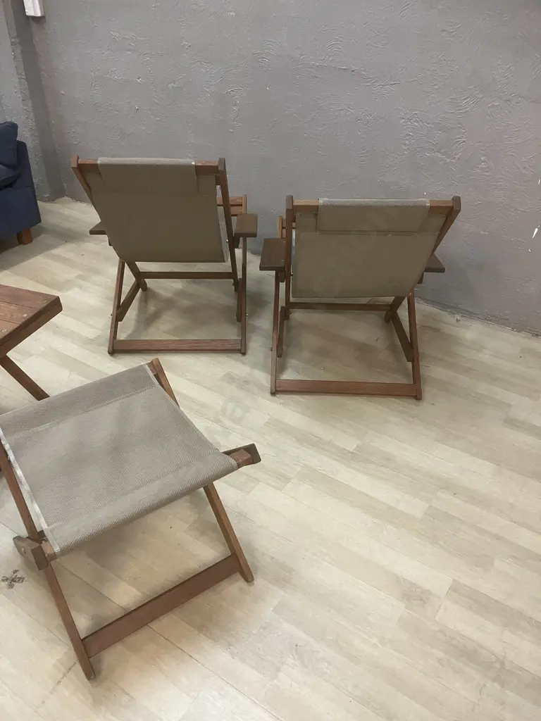 Pair of 'Bottoms Up' NZ Made Hardwood Deck Chairs With Foot Stools, Fawn Colour Upholstered With One Table Top Image 1++