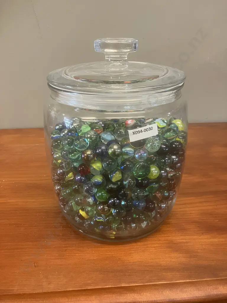 Glass Jar With Marbles Image 1++