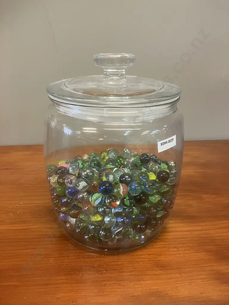 Glass Jar With Marbles Image 1++