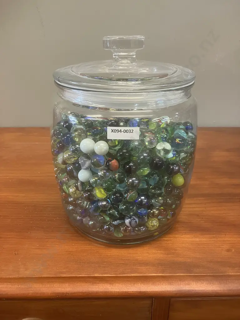 Glass Jar With Marbles Image 1++