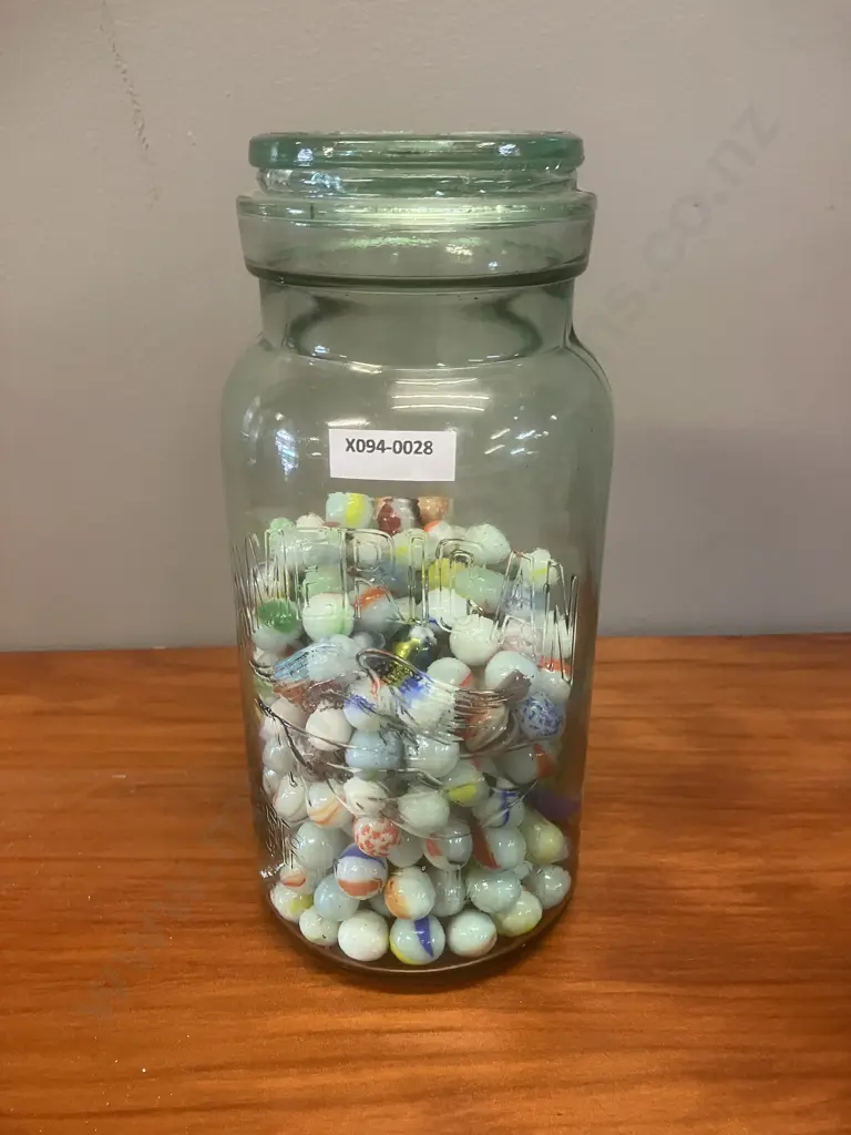 Glass Jar With Marbles Image 1++