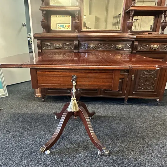 Mahogany Drop Leaf Table Single Drawer Brass Claw Feet On Castors H75,L120,D88cm.