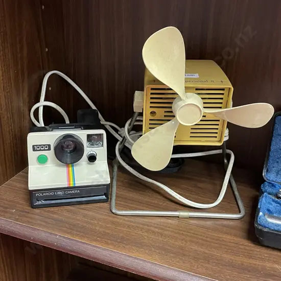 Vintage Polaroid Land Camera with Retro Ralta Desk Fan