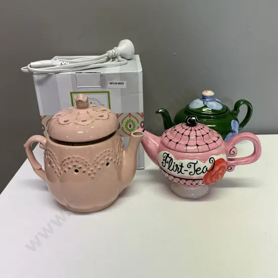 Boxed Scentsy Teapot with essential Oil with two other teapots