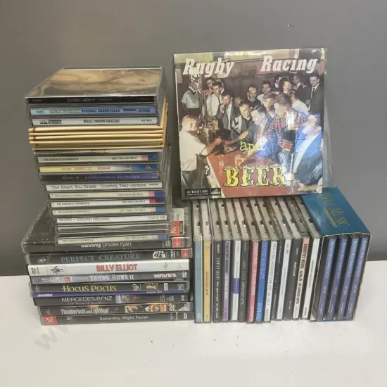 Lot of DVDs, CDs & Rugby Racing & Beer 45(Unable to Sell so Donated)