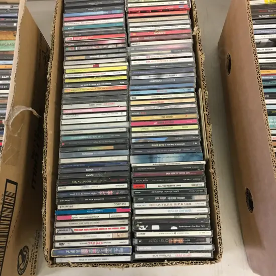 Assorted CDs Including All You Need Is Love Etc