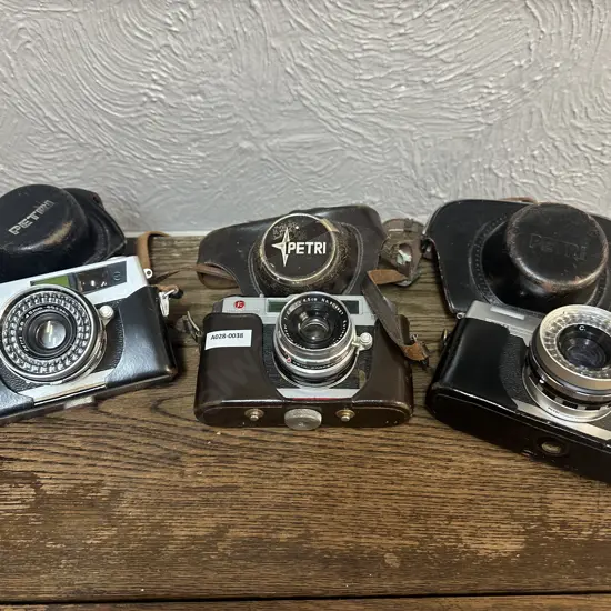 Pair of Petri 7S 35mm Film Cameras 60's Japan 2.8/45mm Circle Eye System Lens, Petri SK With 1.28/45mm, Leather Cases