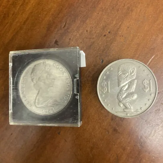 Pair of 1983 Queen Elizabeth ll Cook Islands One Dollar Coins (Sold With -18)