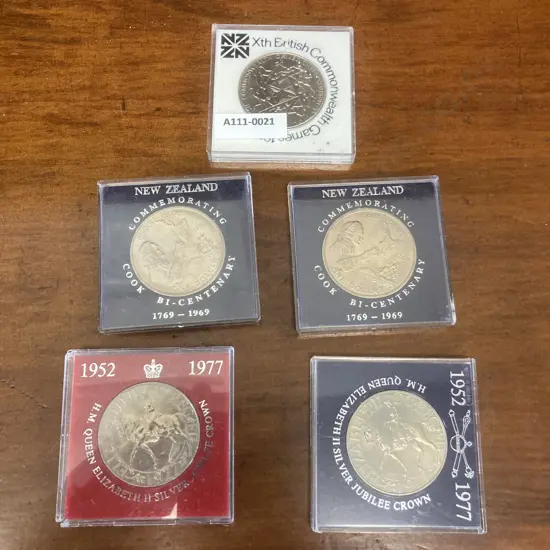 1969 NZ Cook Bi-Centenary One Dollar Coins x 2,1977 Queen Elizabeth Jubilee Coins x 2, 1974 Commonwealth Games $1